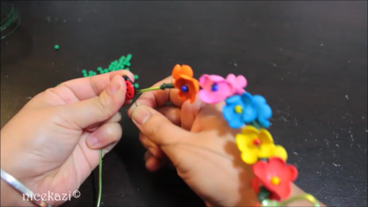 Wrapping the Swing With Flowers and Beads: