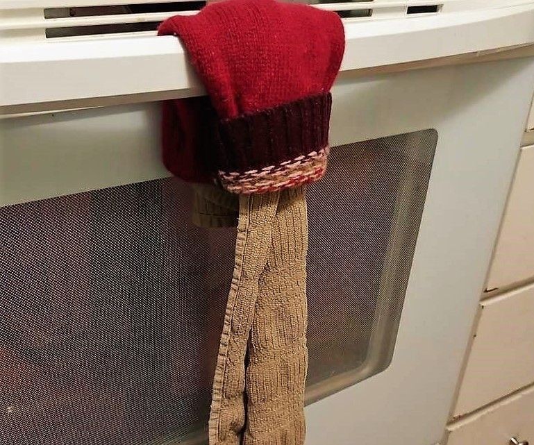 Towel Holder From a Sweater Sleeve