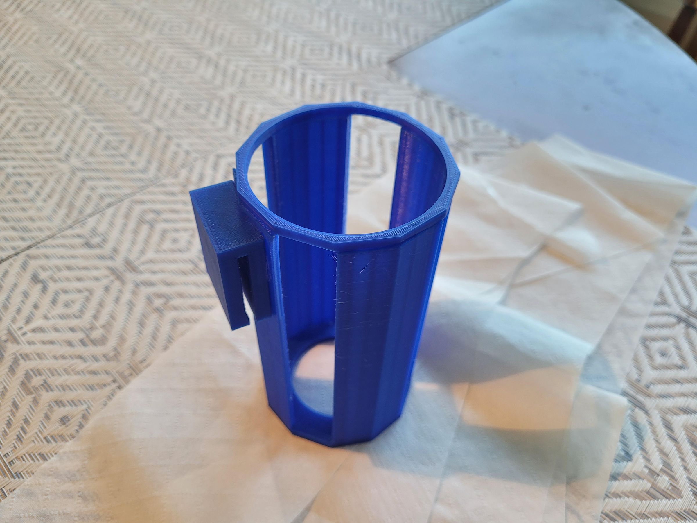 3D Printed Belt Mounted Water Bottle Holder Using Tinkercad 7 Steps