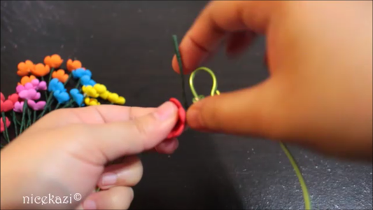 Wrapping the Swing With Flowers and Beads: