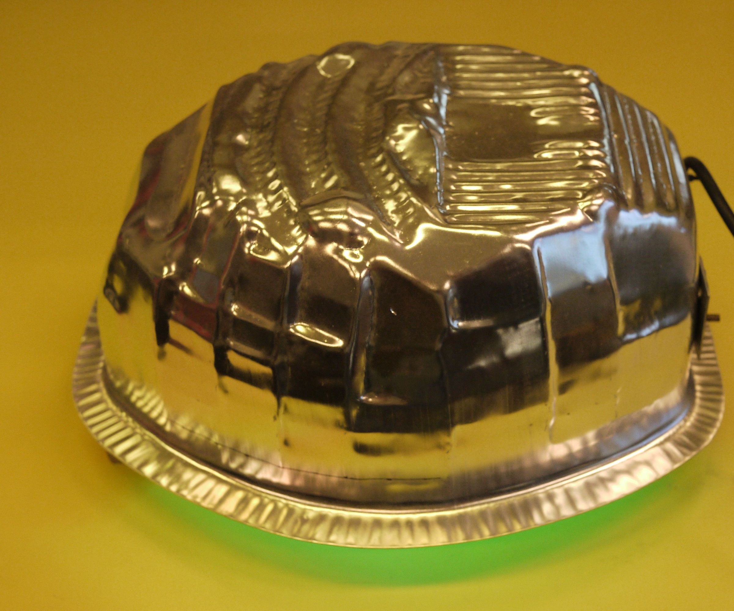DIY Low-cost UV Flood Light for Adhesive-free Bonding of PMMA Microfluidic Chips