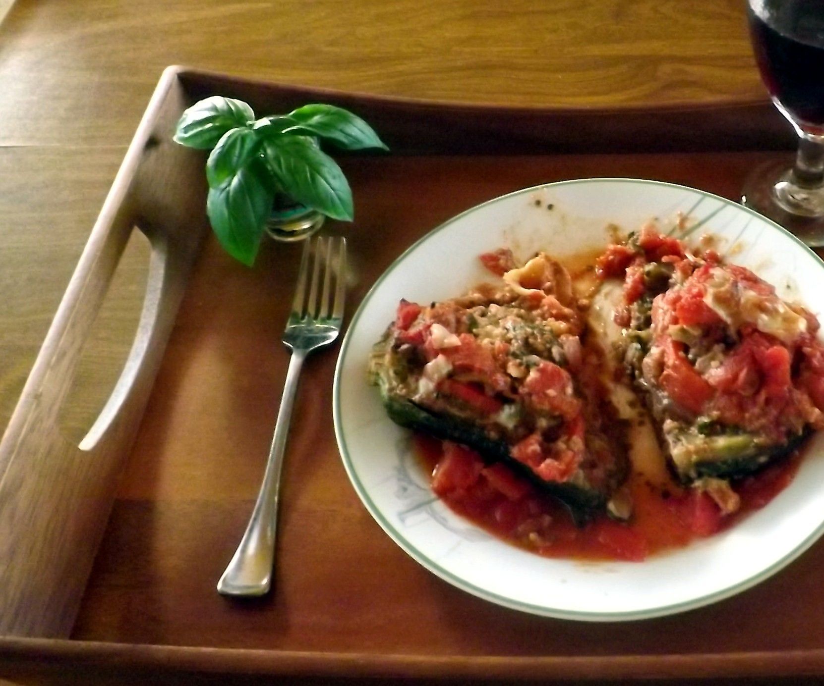 EGGPLANT STUFFED WITH GRUYERE CHEESE, MUSHROOMS, PEPPERS and ONIONS & BAKED IN a RED WINE CLAM SAUCE 