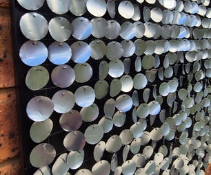 Shimmering Wind-Powered Wall Art Made From Recycled Cans