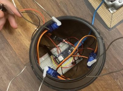 Glue Servos to Lampshade and Attach Arms