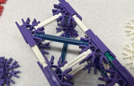 Combine the Purple Assemblies Into the Upper Arm