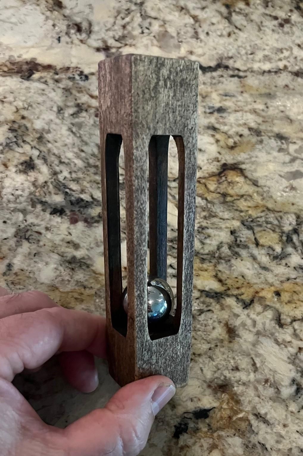 Impossible Steel Ball in a Wooden Cage With a Laser Engraver