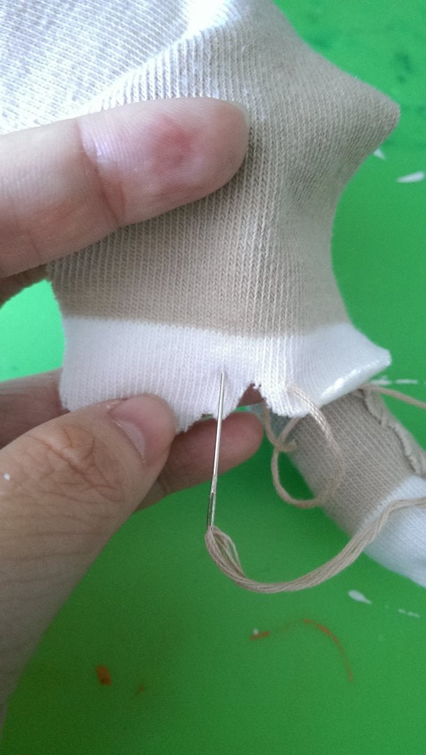 Begin Sewing the Feet/legs Togther 