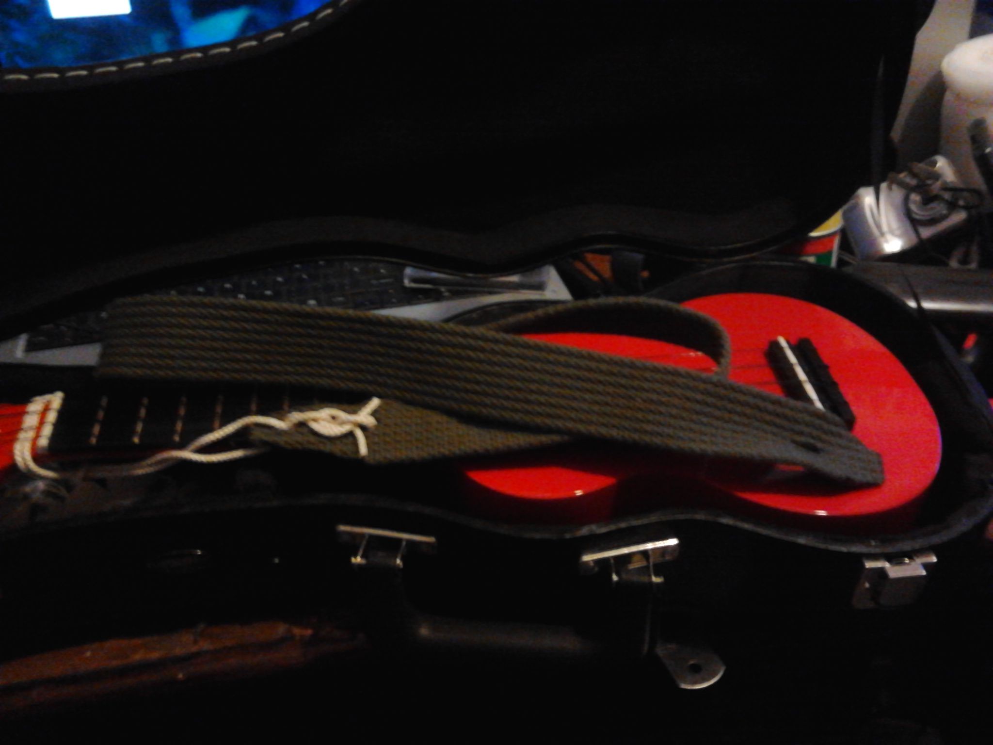 Fit Guitar Strap End Pin Buttons and Gutar Style Strap to a Ukelele. Instructables