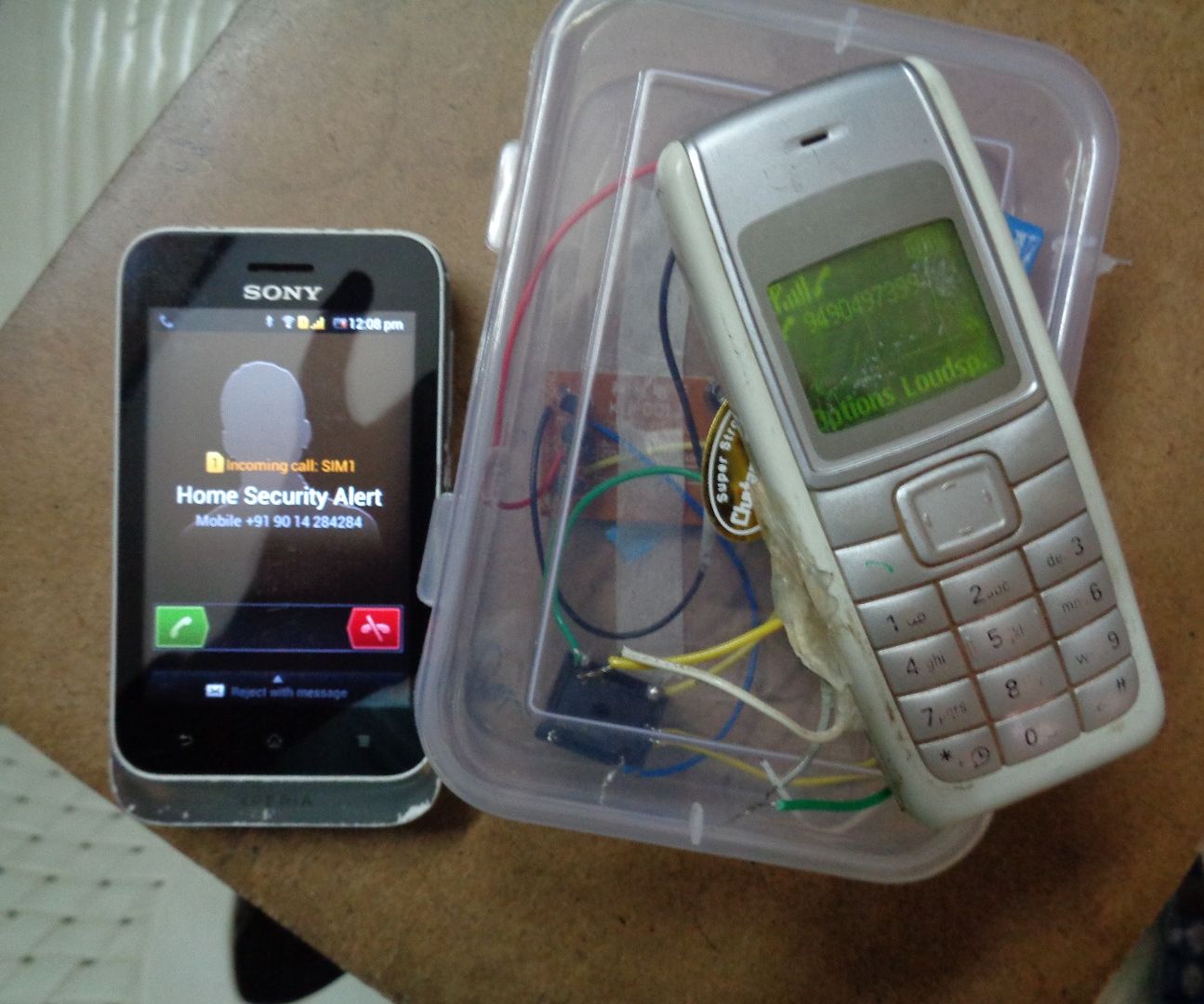 Security system with old r/c car and cellphone