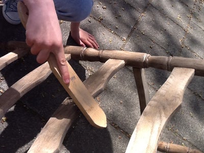 Revamped Rocking Chair With Re-used Insect Screen Ribbons.