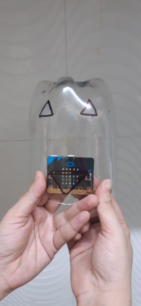 Cutting and Marking the Recycled Bottle for DIY Halloween Lantern