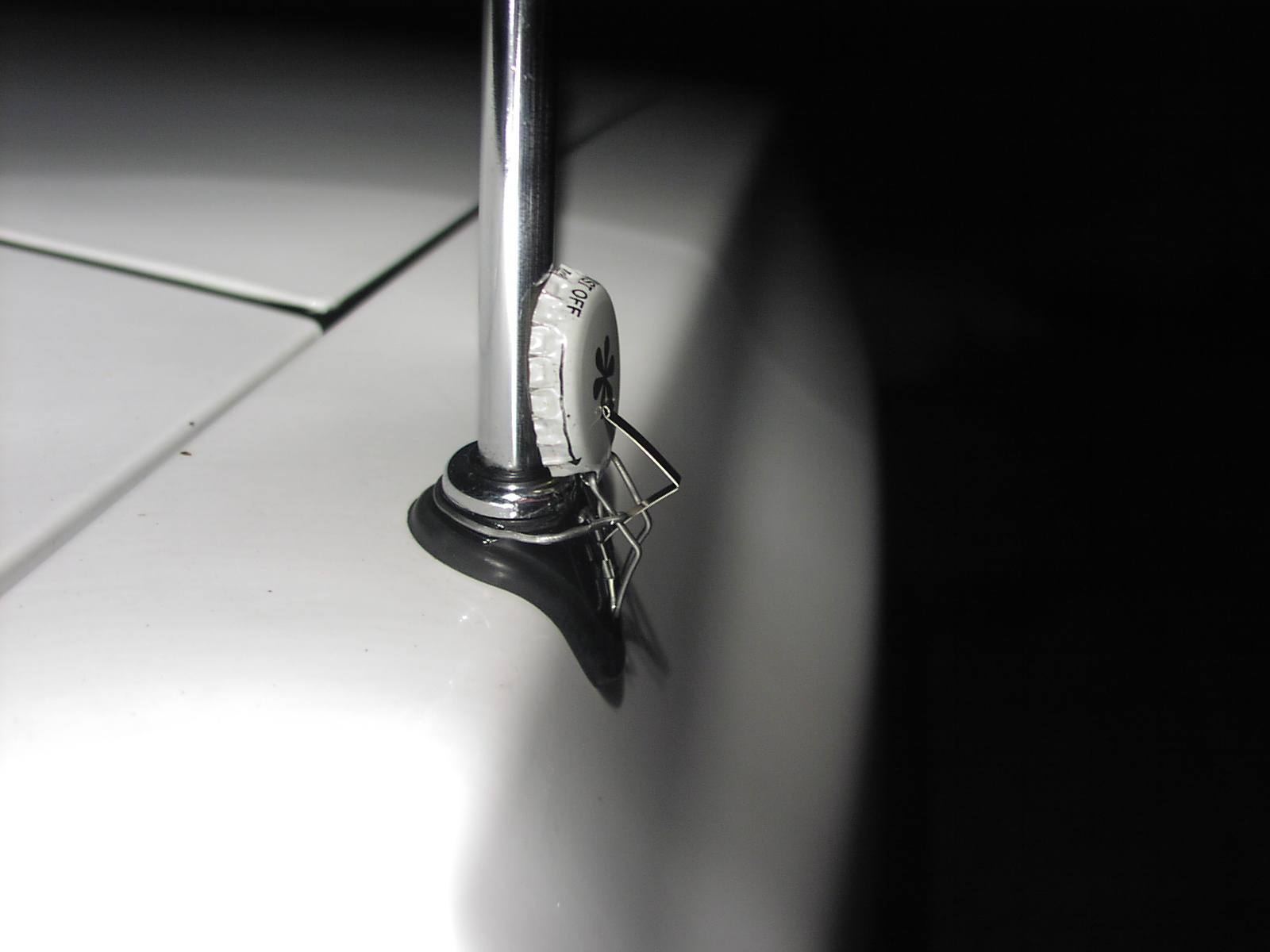 Pop-Bottle-Cap Antenna Protector