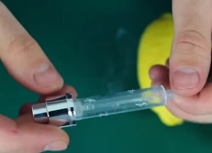 Insert the Syringe Into the Lemon and the Lemon Spray Is Ready for Spraying On. 