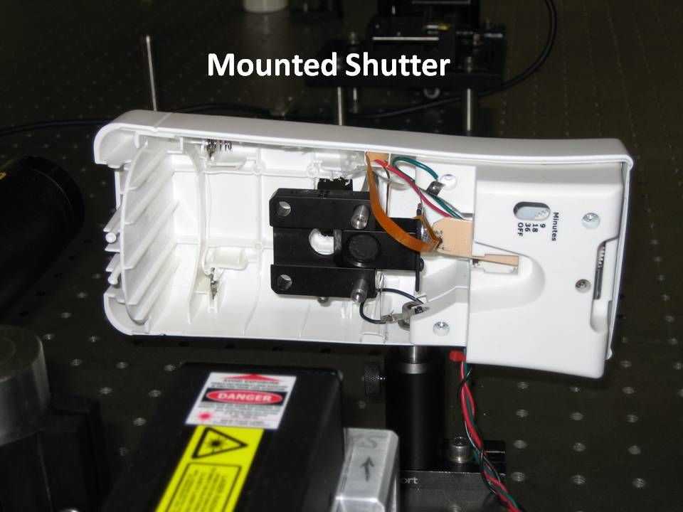 Air-freshener based mechanical laser shutter