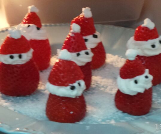 Decorated Dessert - Santa Claus Made ​​from Strawberries and Whipped Cream