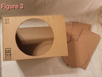Cut a Hole on One Side of the Cardboard Box