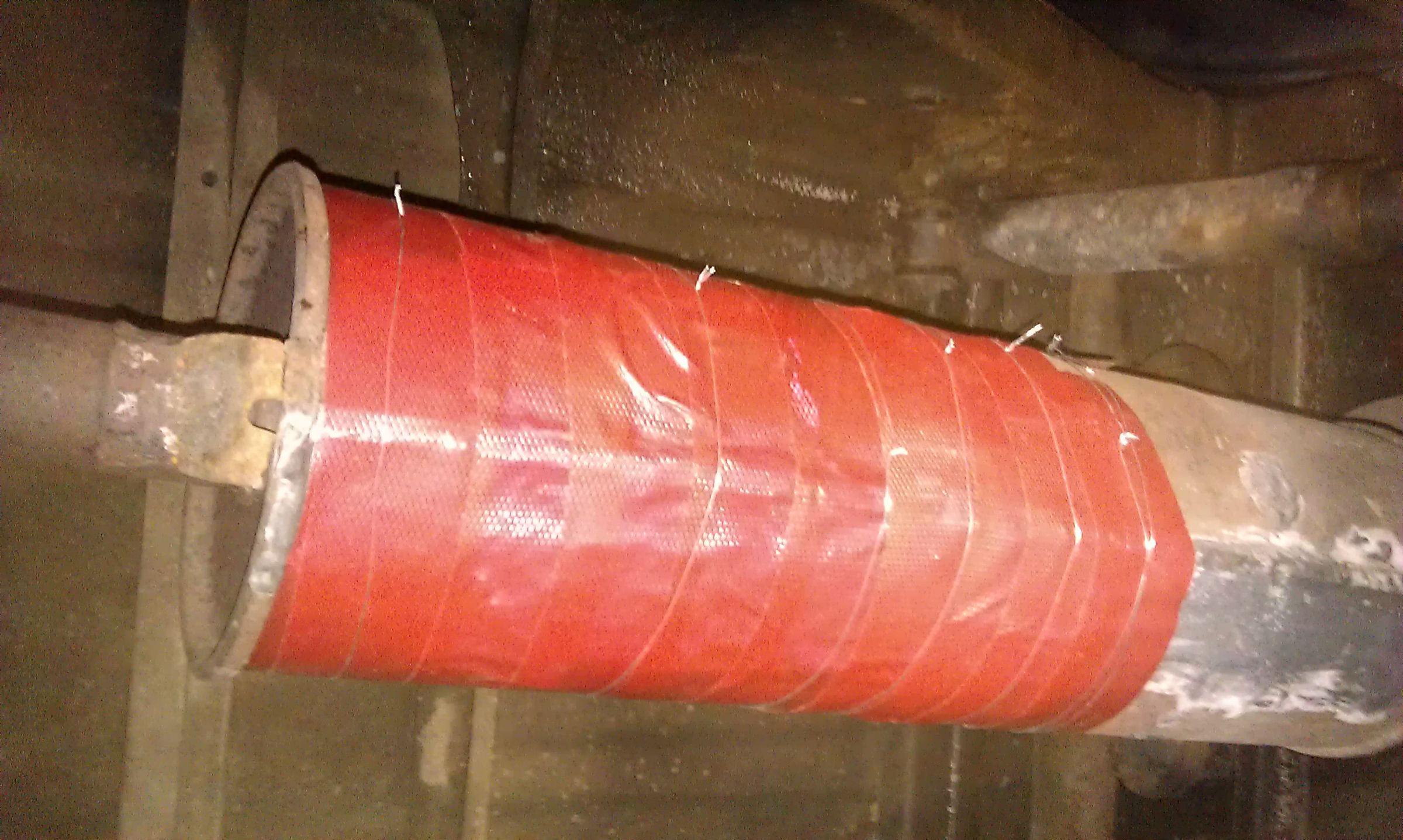 Leaking Exhaust / Muffler / Silencer Repair With Repair Paste and Epoxy Bandage Strips Kit on a Toyota Hilux.