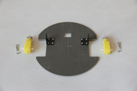Install DC Motors on the Brackets