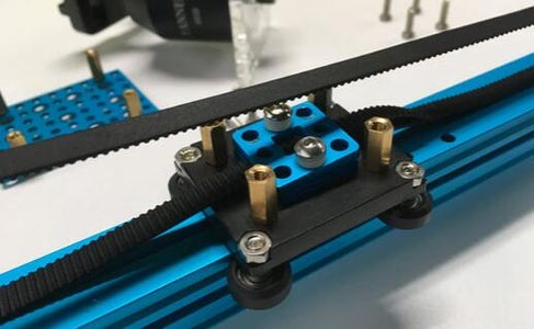Stabilize the Belt by the Connectors, and Fix the Connectors on Slider Plate.