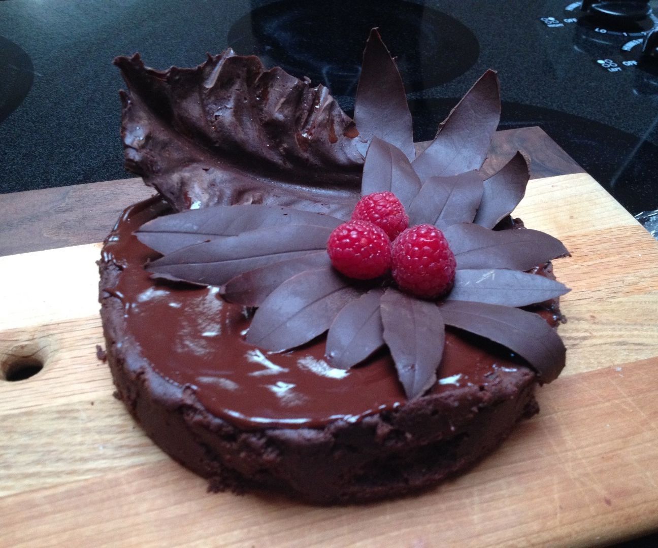 Chocolate Oblivion Torte With Chocolate Bay and Cabbage Leaves
