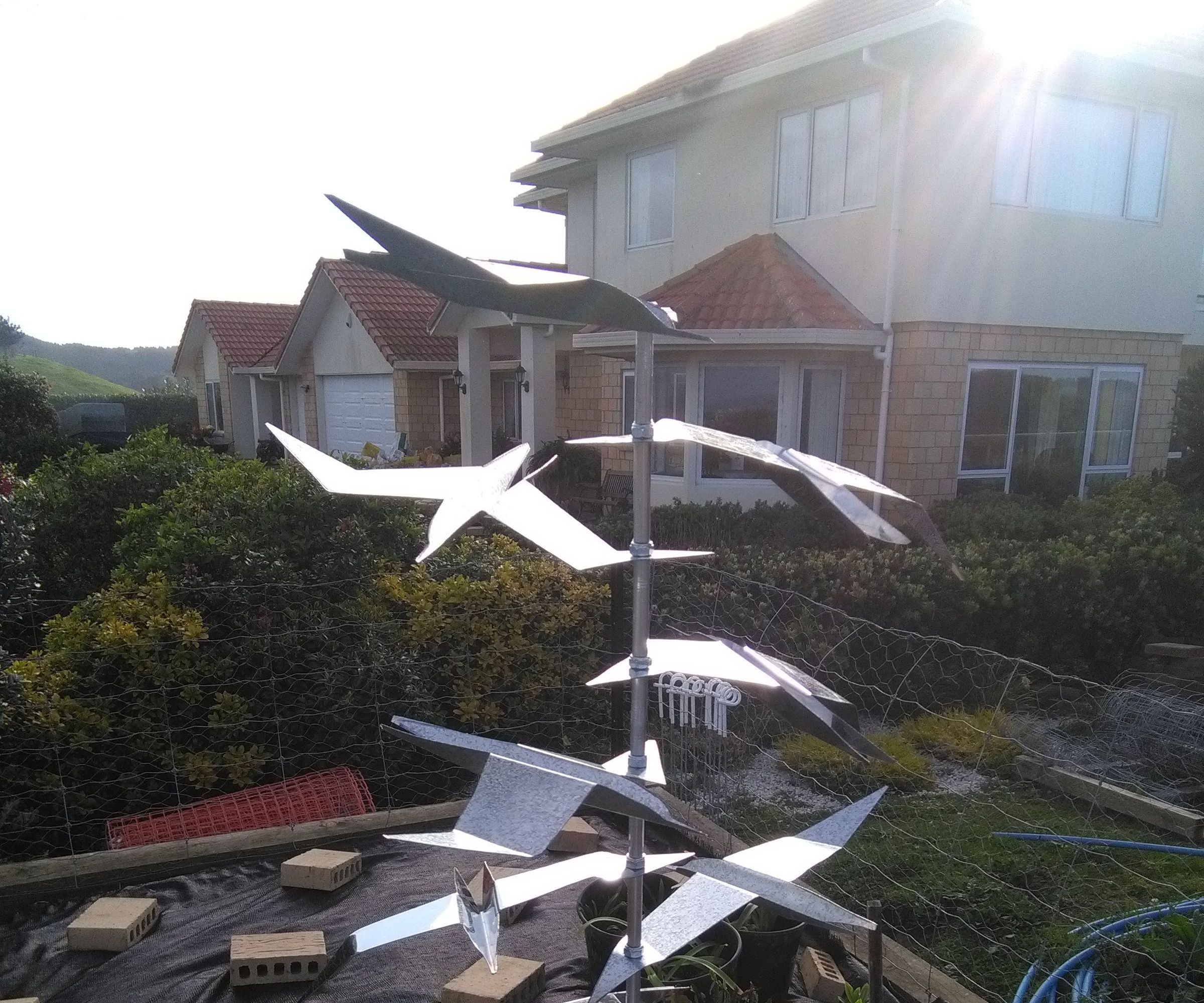 Metal Bird Sculpture From Reclaimed Sheet Steel and Tube
