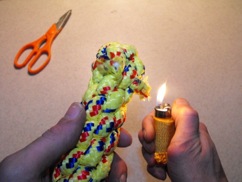 Melt the Exposed Nylon Rope and Push Back With Side of Lighter