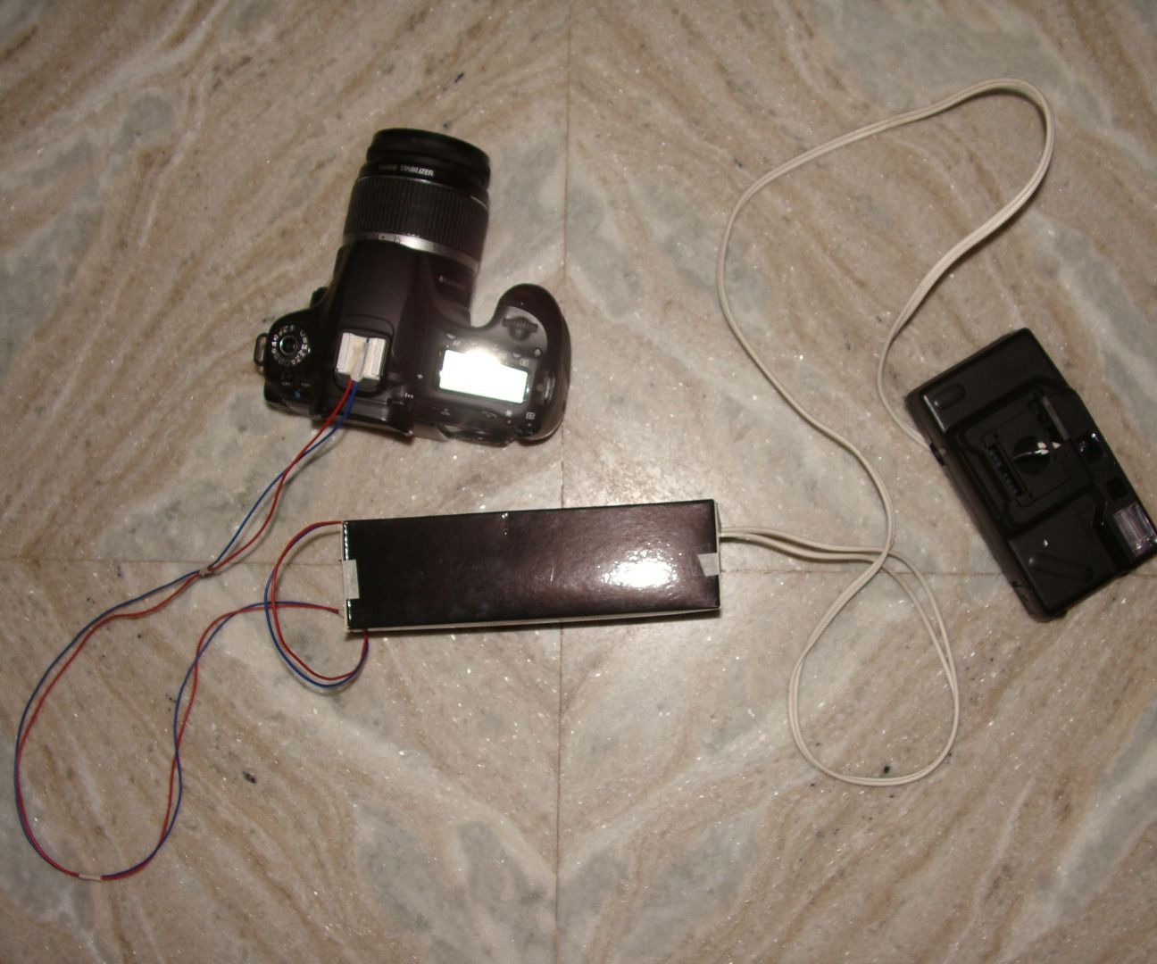 DIY Hot-shoe Triggered Off Camera Flash, Out of a Disposable Film Camera