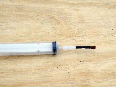 Add the Brush Applicator to the Bottle and Use