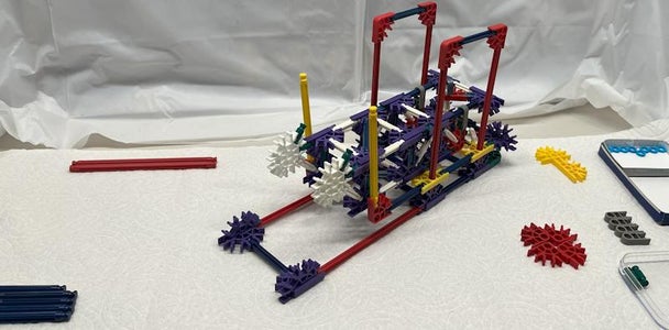 Place the Upper Arm Assembly