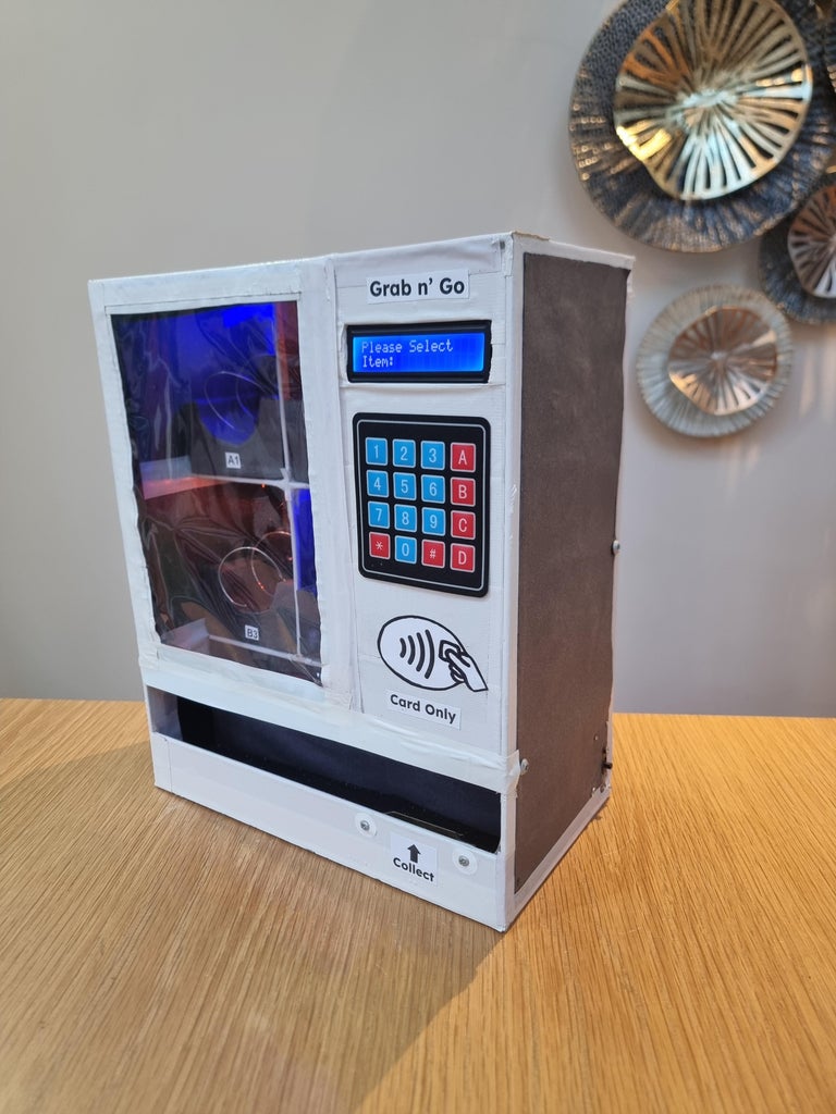 Craft Your Own Desktop-Sized Cardboard Vending Machine With an Arduino ...