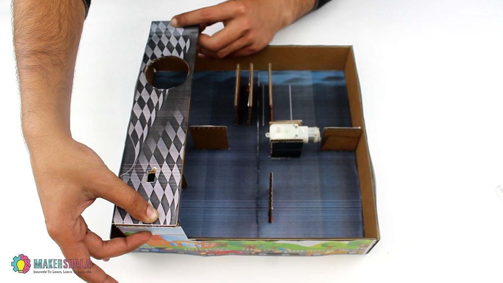 Take the Top Part and Paste It to the Sides Using Glue Gun.