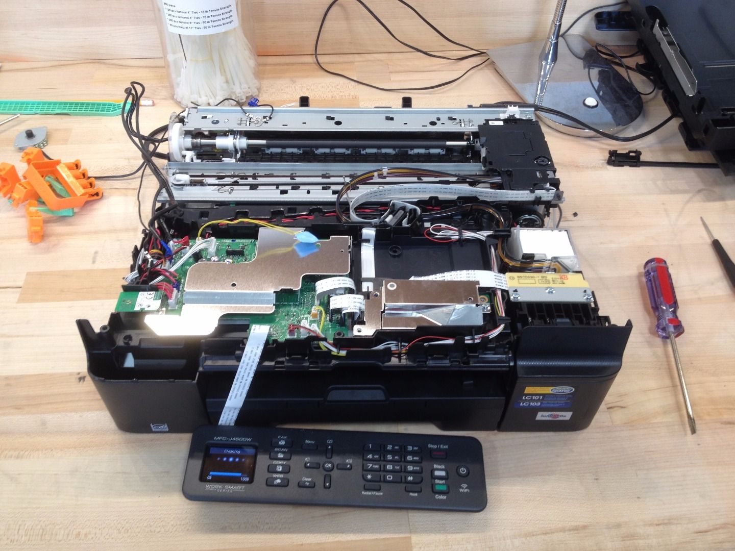 Disassembling a Brother MFCJ450DW Printer 31 Steps Instructables