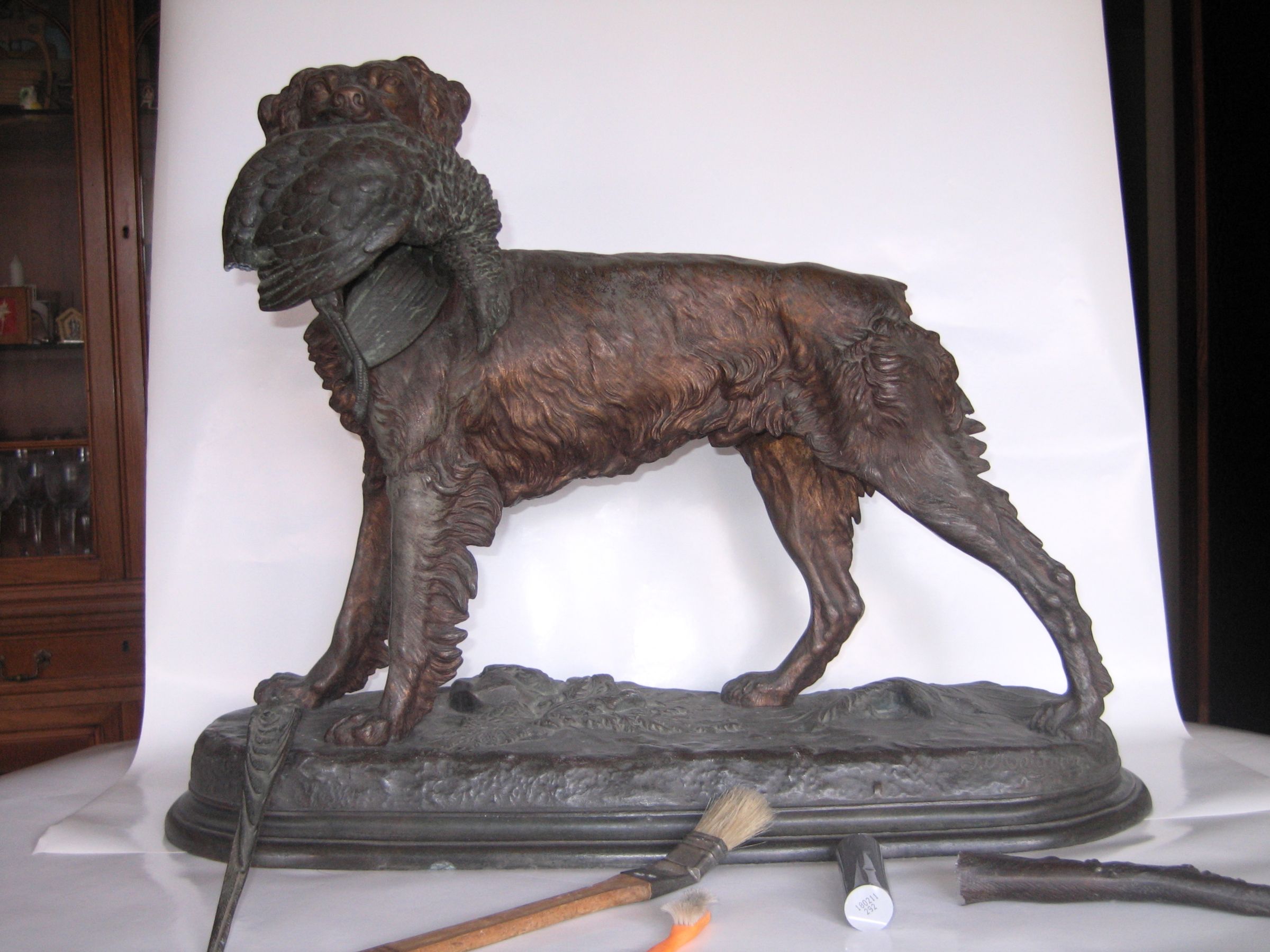 How to Repair a Sculpture of a Dog and Pheasant