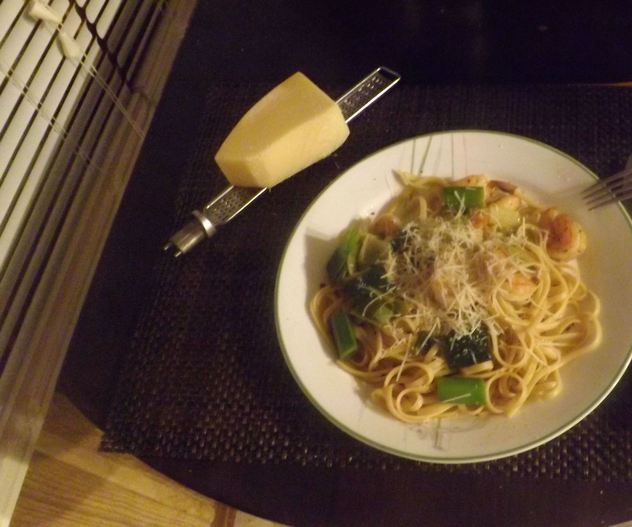 Sauteed Shrimp With Garlic & Leeks (prepared in a Rum-cream Sauce and Served Over Pasta)