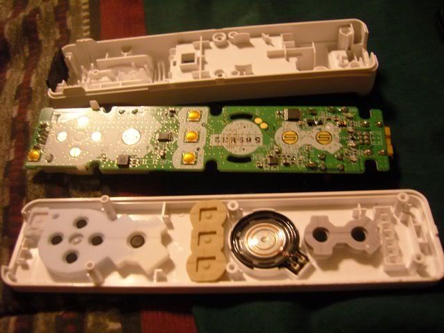 Dis-assembly of Holster, Game Boy, and Wiimote