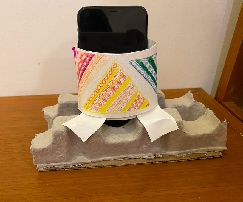 Phone Holder With a Charging Outlet