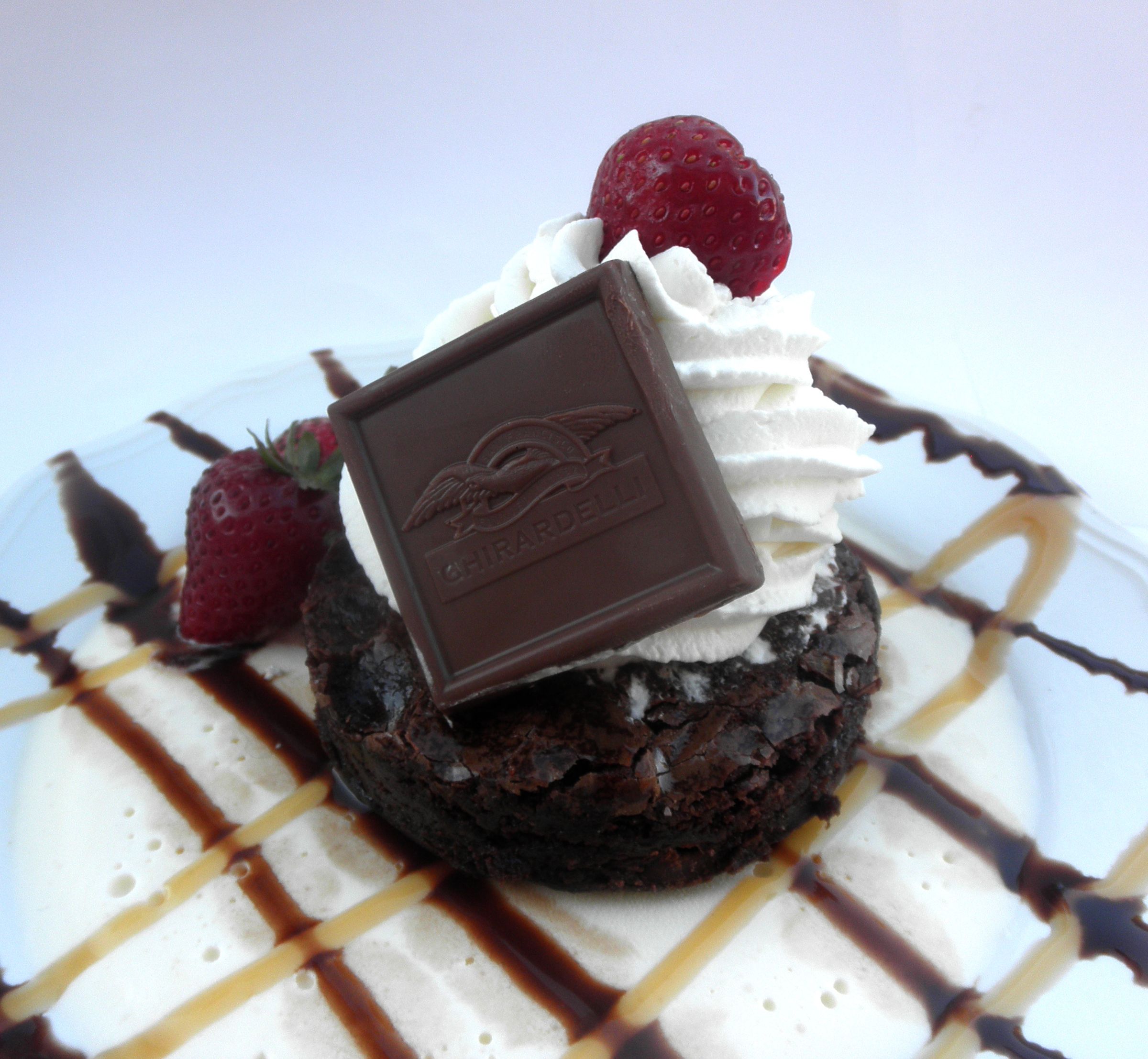 Ghiradelli Brownie Sundae on a "PLATE" of Icecream
