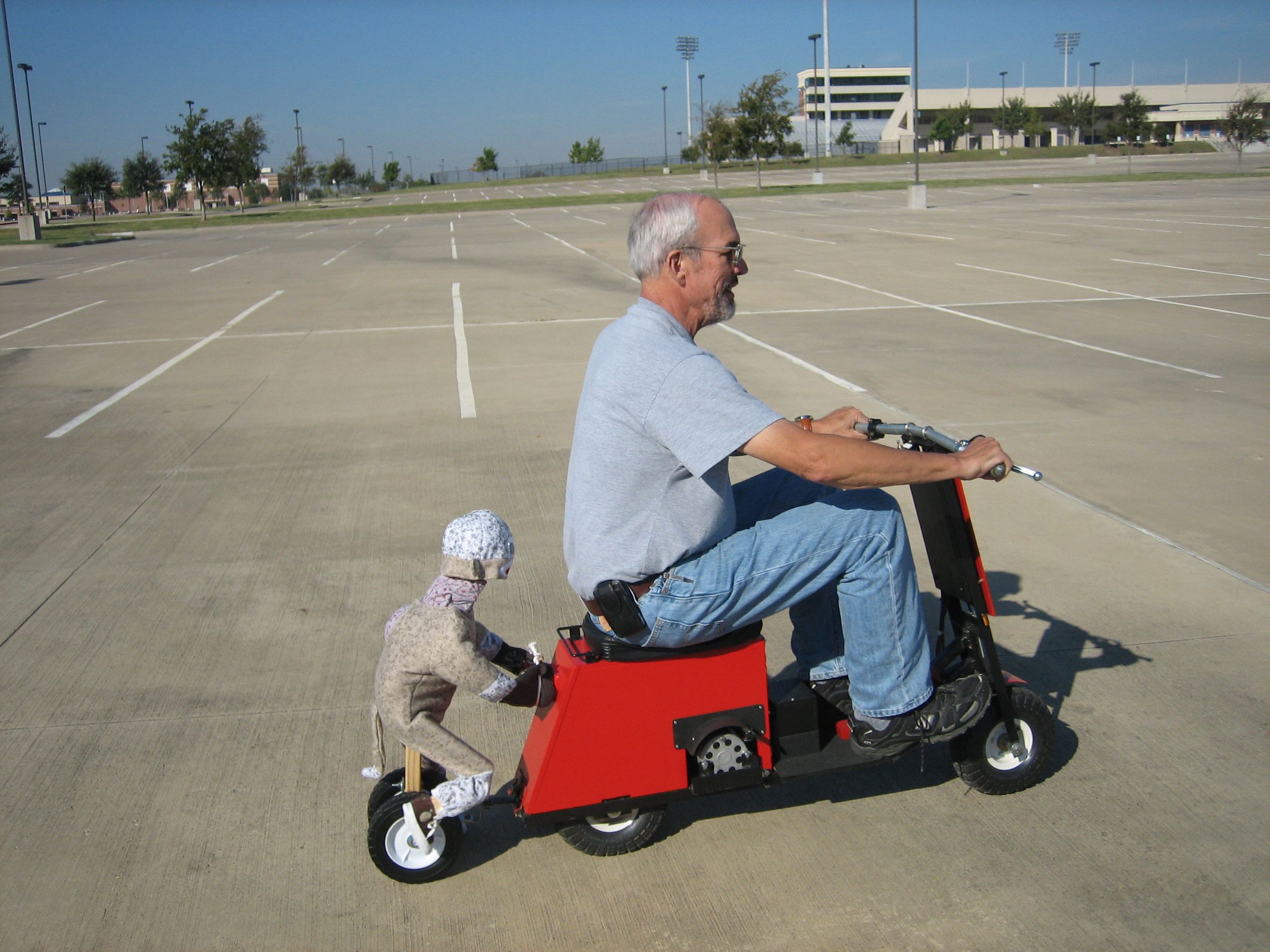 Electric Scooter Pushed by Monkey