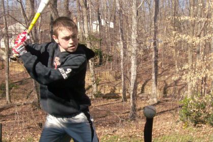 Hitting a Baseball Off a Tee