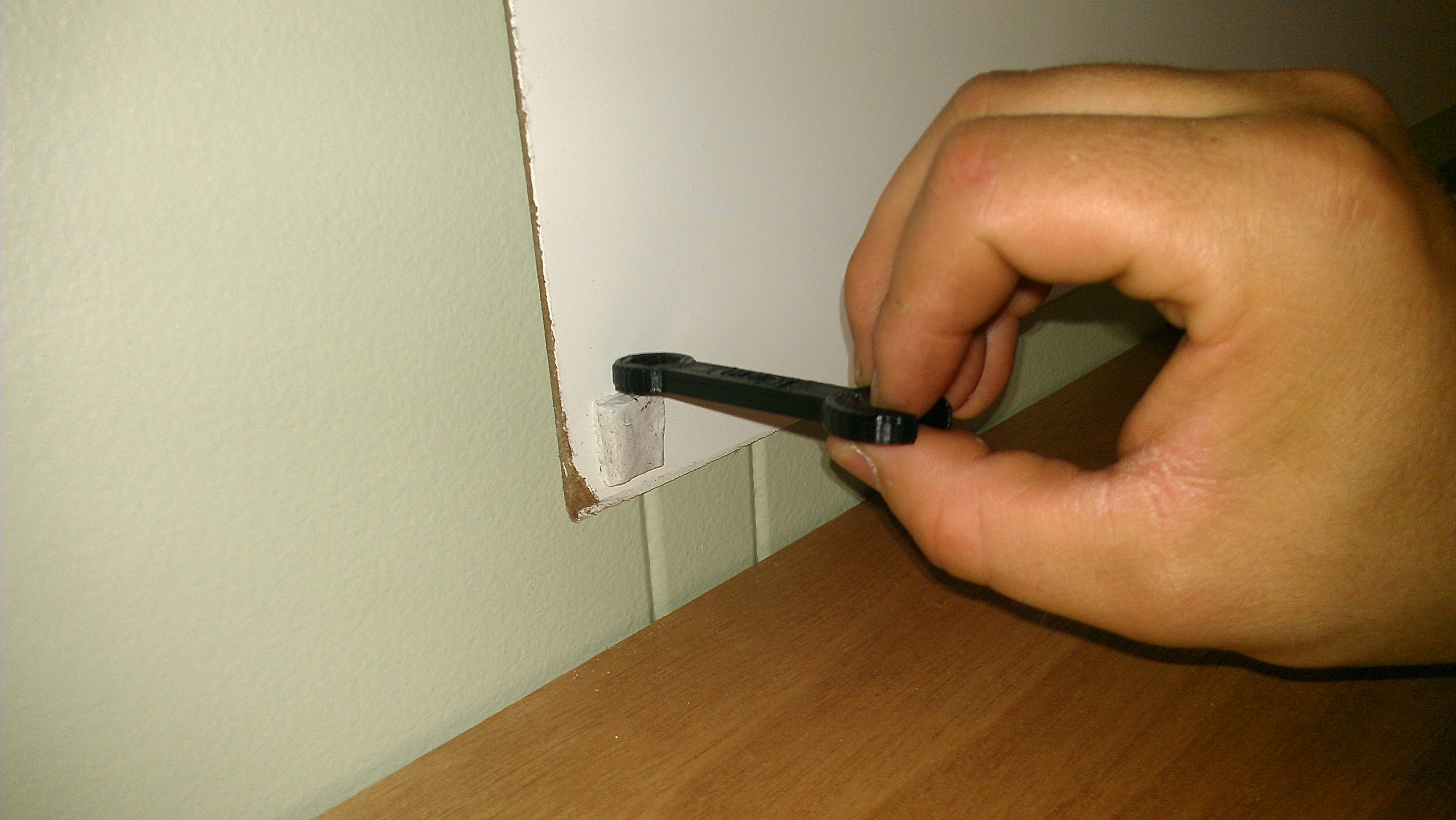 Use Sugru to Cover an Unsightly Fastener