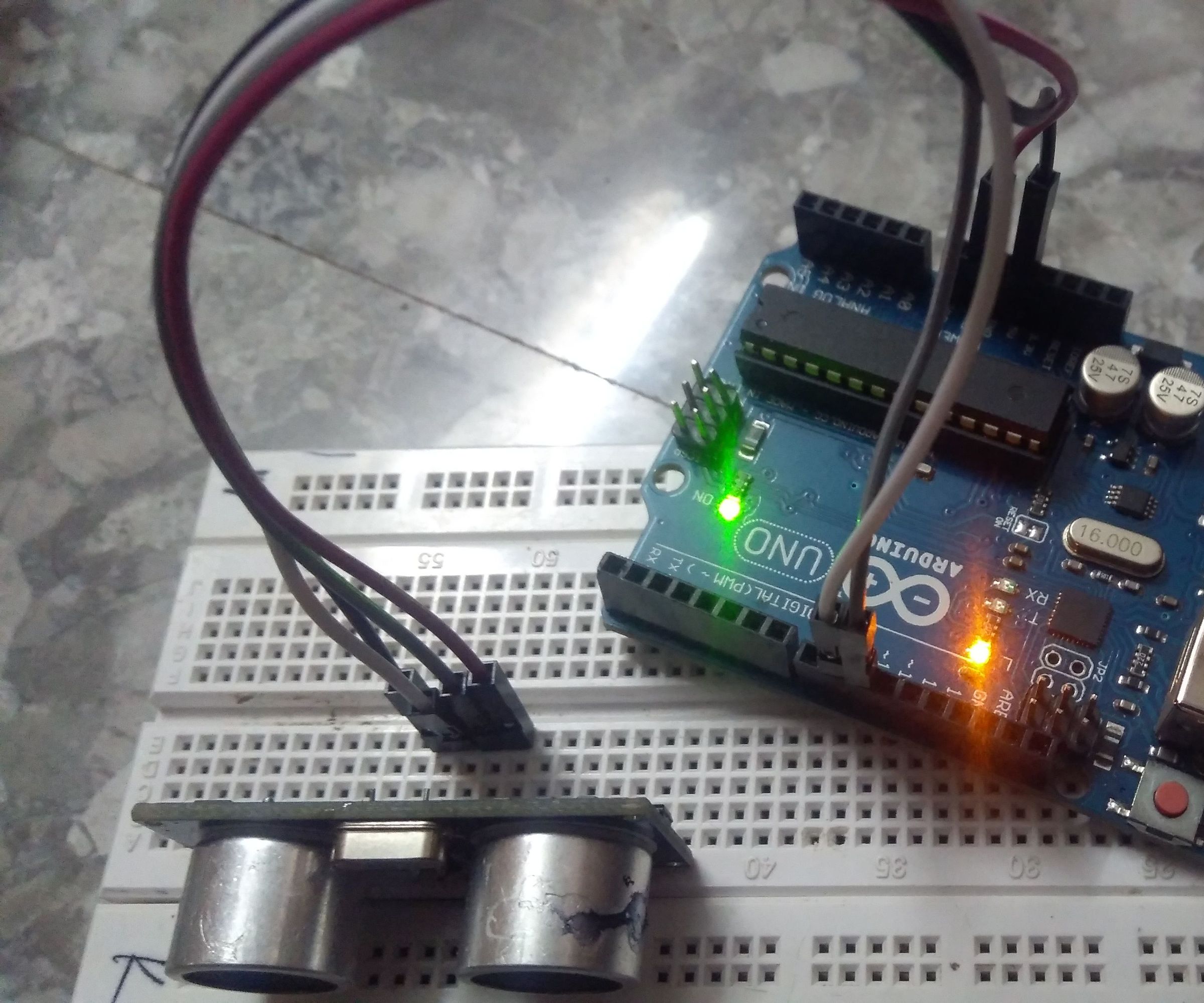 INTERFACING HC- SR04 ULTRASONIC SENSOR WITH ARDUINO