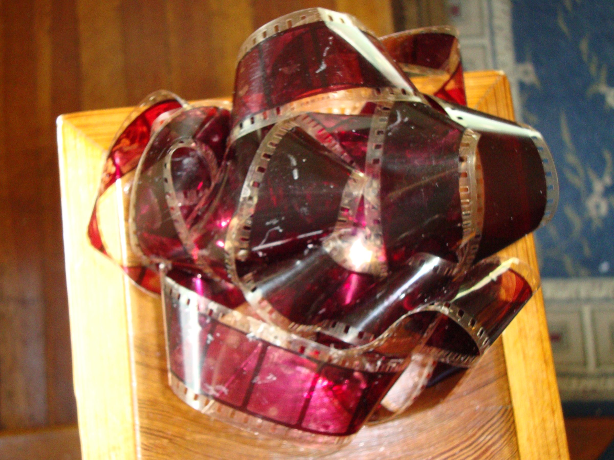 Old Film Strip Upcycled Into a Film Gift Bow