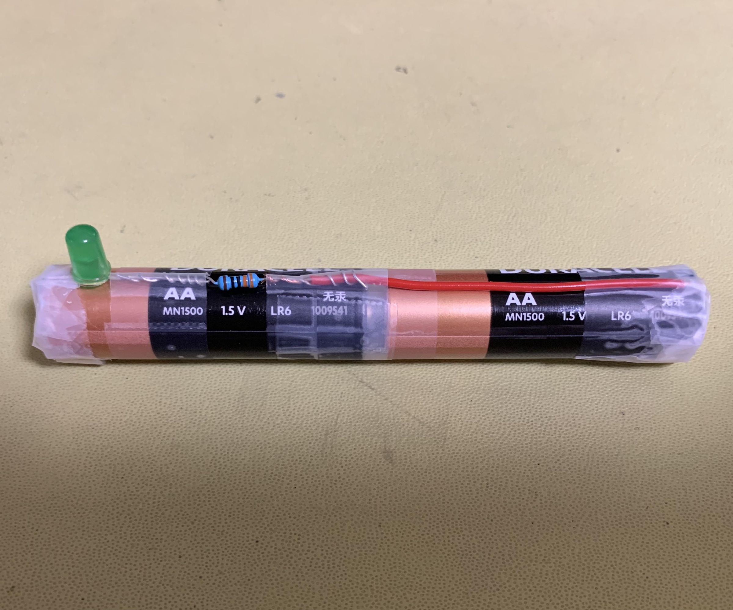 How to Turn LED on With AA Battery