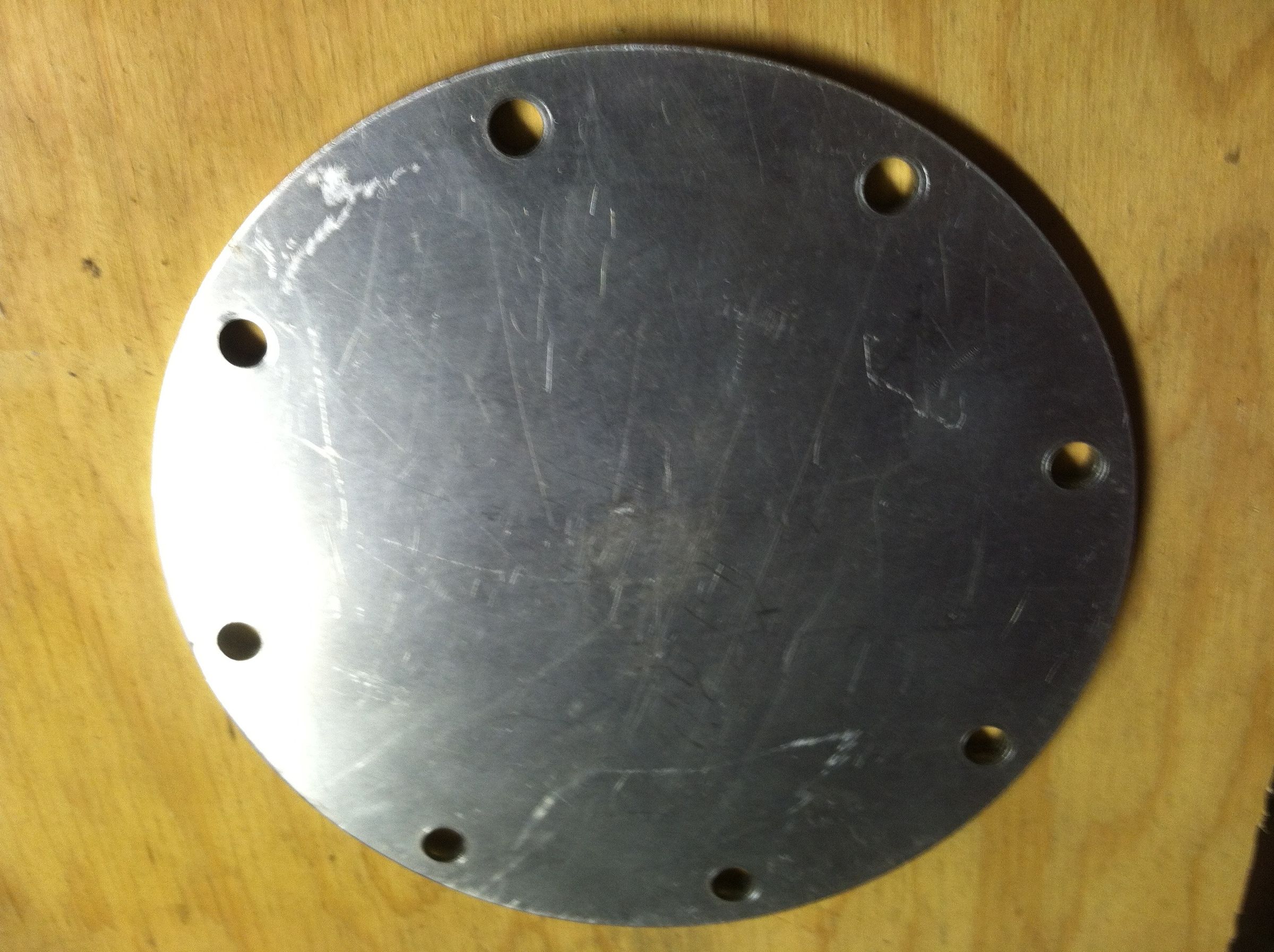 How to find the center of a round plate (and drill a bolt hole circle)