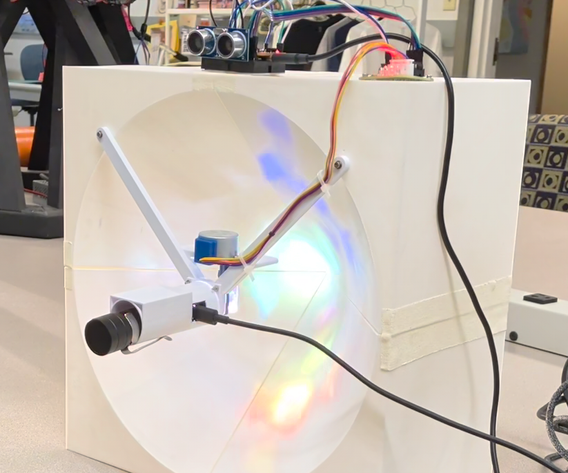 Suncatcher - Projecting Rainbows by Spinning Dichroic Glass in Front of a Light