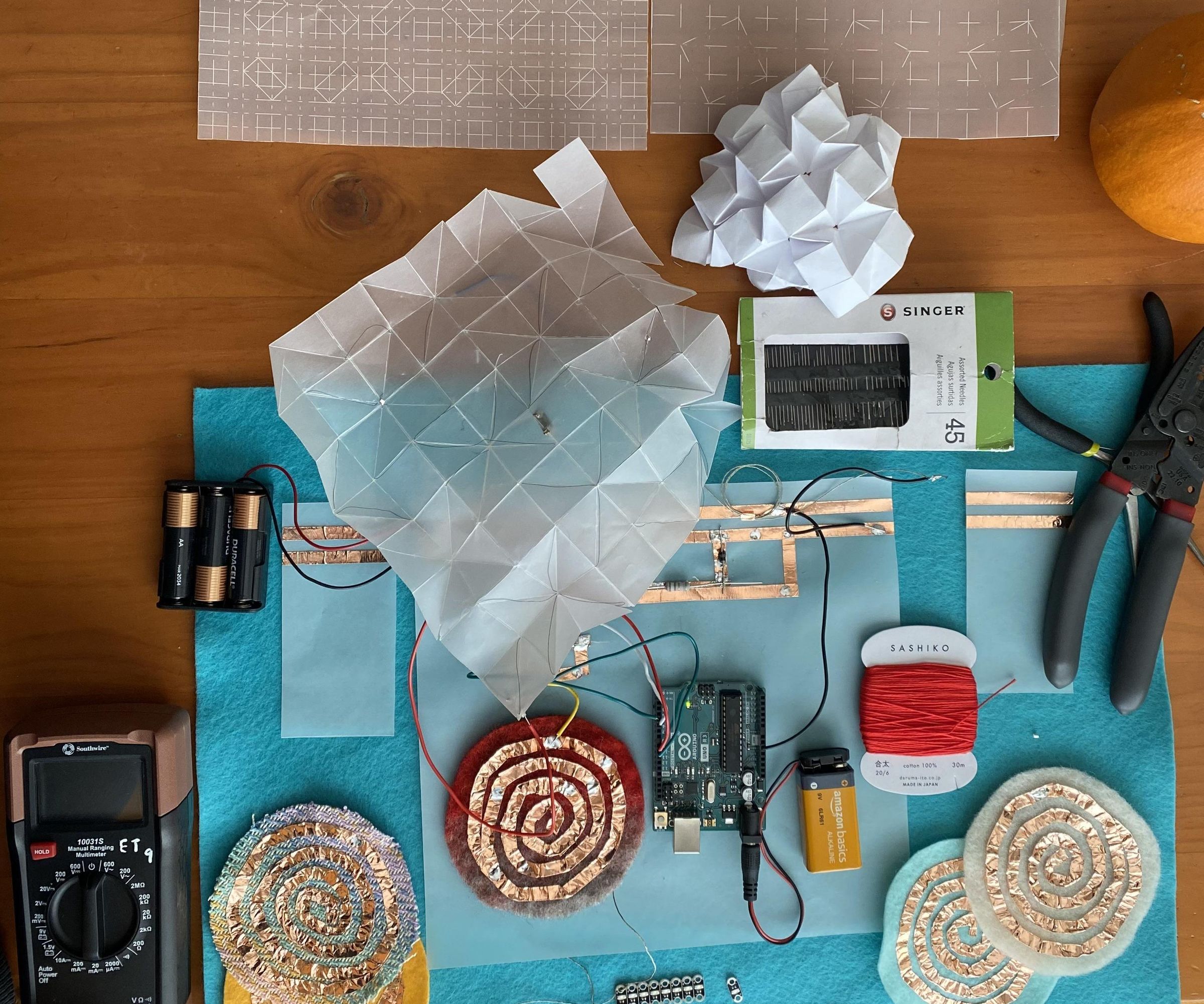 Shape Shifting Origami Desk Light: a Framework