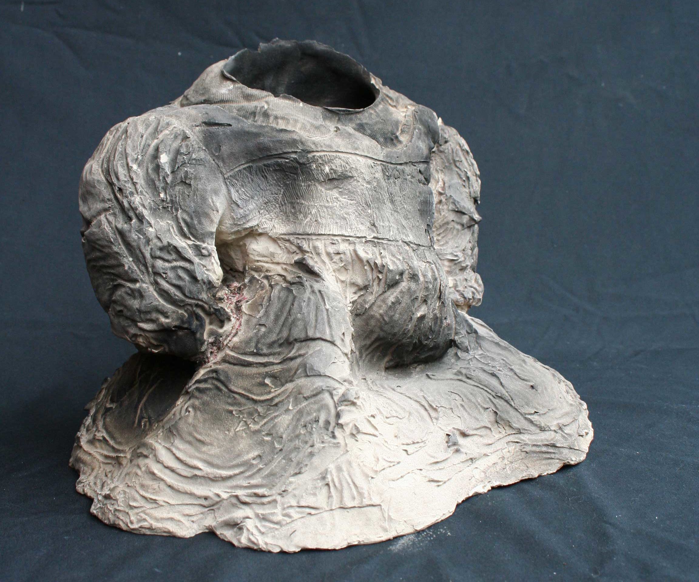 Burnt Babies Decoration Made Out of Clay and Clothes