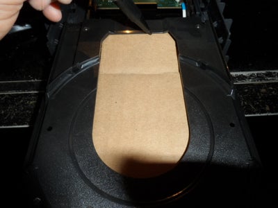 Acoplando La Charola Del CD-ROM / Putting the Tray of the CD-ROM