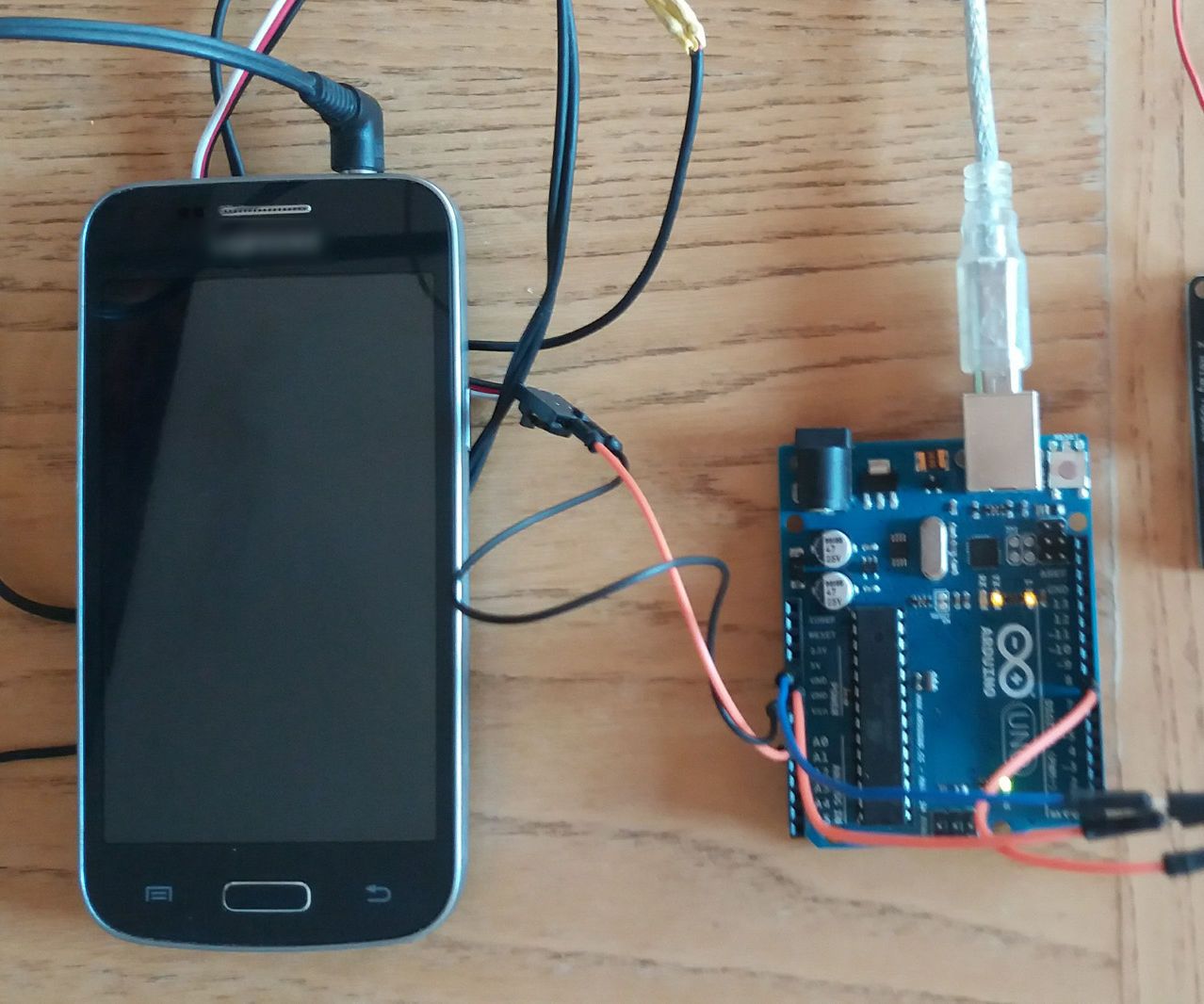 IOT Door Opener - With Old Smartphone and Headphones