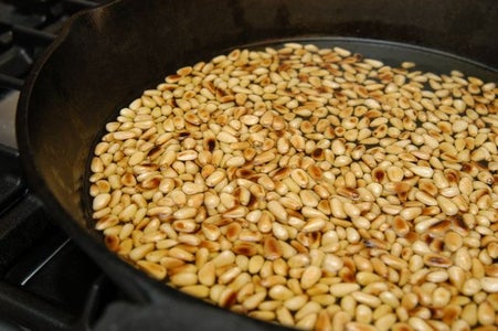 Cover Pine Nuts in Extra Virgin Olive Oil